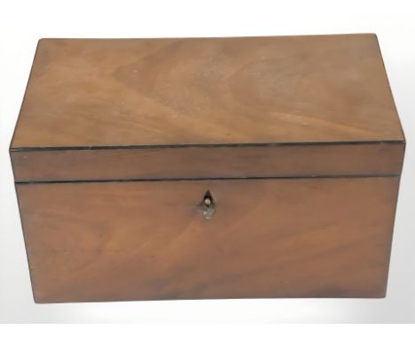 A 19th century walnut tea caddy.