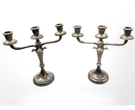 A pair of Italian loaded silver three-sconce table candelabra, stamped 800, height 25.5cm. 