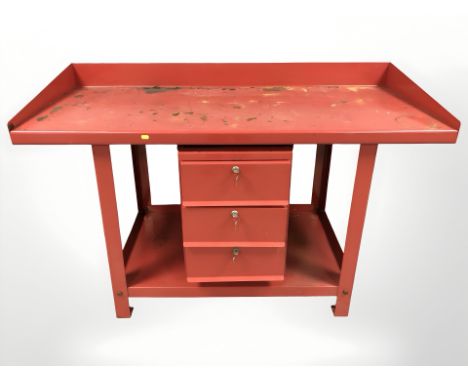 An enameled metal work shop bench, 151 cm x 66 cm x 100 cm, with keys 