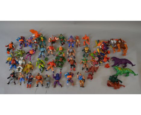38 x Mattel Masters of the Universe action figures, most complete with weapons and accessories. Unboxed, G+, some paint wear 