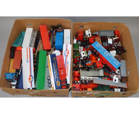A good quantity of unboxed diecast lorries, tractor units and trailers in various styles, mostly by Corgi with damage and rep