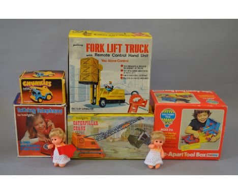 Quantity of assorted toys: Palitoy Take-Apart Tool Box; two unboxed Palitoy Carrie dolls; Palitoy Fork Lift Truck; Bradgate T