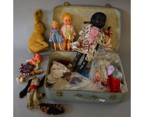 Four variously sized clothed dolls, an unboxed Pelham Puppet 'Tyrolean Girl', a vintage straw filled rabbit soft toy and  a '