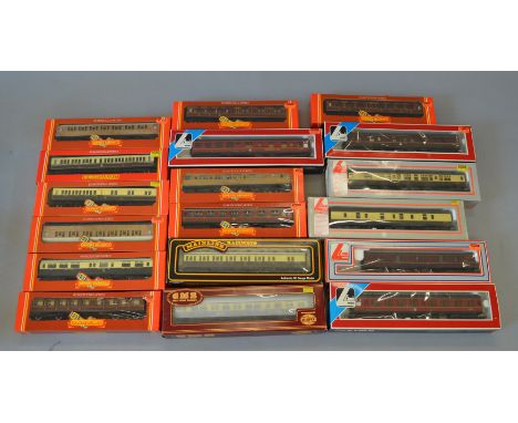 OO Gauge. 18 boxed Coaches by Hornby, Lima and Mainline, in various liveries. Overall VG.