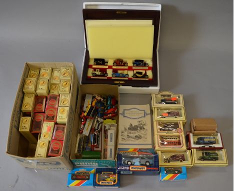 A mixed lot of boxed diecast including Models of Yesteryear, a M-O-Y wooden cased set of models and some by Lledo, all genera