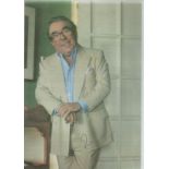 Dame Joan Collins DBE and Percy Gibson signed colour photo, measures 6 inch by 9 inch. Good