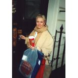 Dame Judi Dench signed colour photo, measures 6 inch by 9 inch. Good condition Est.