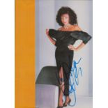 Dame Joan Collins DBE signed magazine page. Good condition Est.
