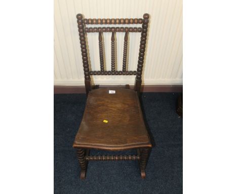 A BOBBIN ROCKING CHAIR OF SMALL PROPORTIONS 