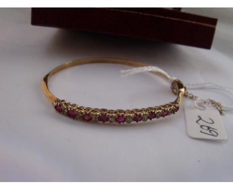 Good 9ct ruby & diamond hinged bangle  7.3g inc – boxed       