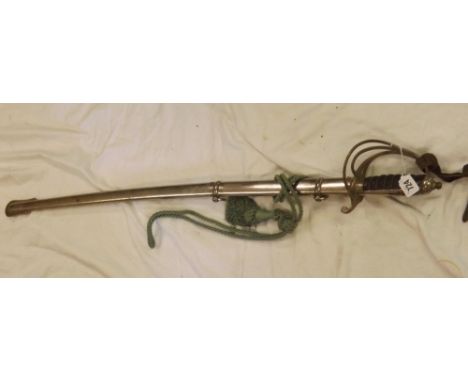 A Sabre in metal scabbard      