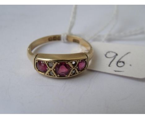 An 18ct gold three stone ruby  ring approx size 'O'       