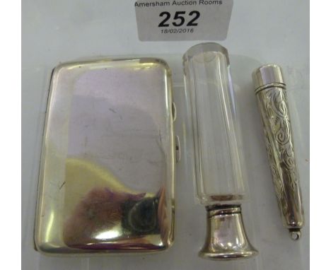 Silver collectables: to include an Art Deco glass scent bottle with an enamelled silver cap  Birmingham 1924        11