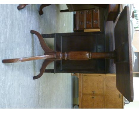 An early 19thC mahogany pedestal table, having a ring turned column, raised on a splayed tripod base  28''h  20''w           