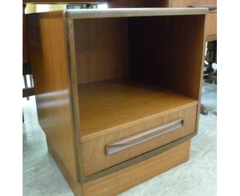 A G-plan teak bedside cabinet, having a shelf and a drawer, on a plinth  17''h  18''w        RAM