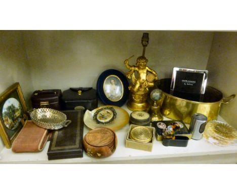 A mixed lot: to include two jewellery boxes; a set of six lacquered brass champagne coasters; and a gilded, cherubic design t