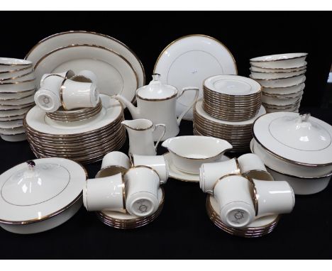 A NORITAKE DINNER SERVICE FOR TWELVE with 'gold and platinum' rim (some signs of use), and a Royal Worcester 'Viceroy' cake p