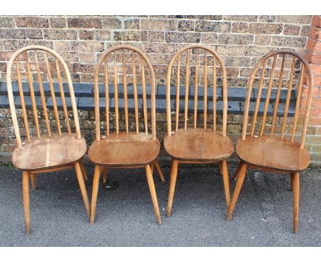 A SET OF FOUR ERCOL STYLE STICK-BACK CHAIRS the hoop backs 97cm high (for restoration)