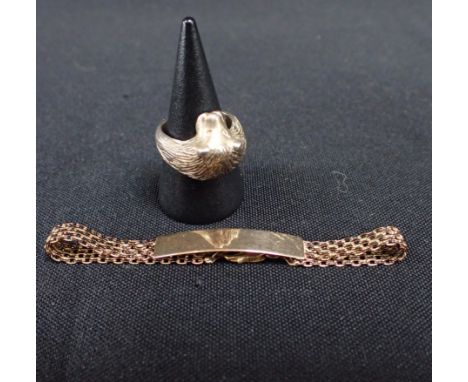 A 9CT GOLD BRACELET and a lion ring in sterling silver from Zambia