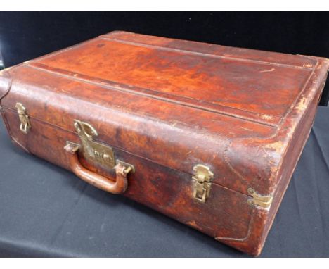 A VINTAGE LEATHER SUITCASE, WITH PATINATED SURFACE by Kaufmann's Pittsburgh, 63 x 46 x 21cm, with combination lock (unknown, 