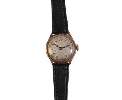 A LADIES 9CT GOLD WRISTWATCH with manual wind movement, the silver sunburst dial with black Arabic numerals and dark blue ste