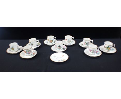 A PART SET OF BING &amp; GRONDHAL COFFEE CUPS AND SAUCERS with floral decoration, signed 'A. d.l. Cour' (9 cups, 10 saucers, 