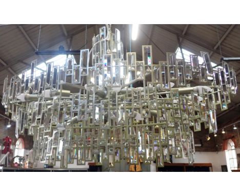 A MODERN CHANDELIER BY MW LIGHTING "prismatic lustres within a metal frame, with Dimmable LED lights approx 110 x 57cm, 87cm 