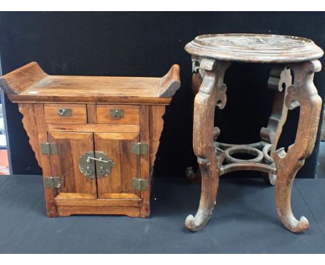 A CHINESE  HARDWOOD VASE STAND 55cm high, for a vessel with 31.5cm dia foot rim (finish poor), and a small Chinese table cabi