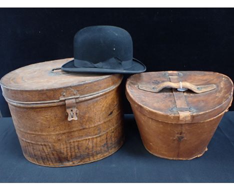 A VINTAGE LEATHER TOP HAT CASE, A BOWLER HAT by Moores (small size), and a painted tin hat box (3)