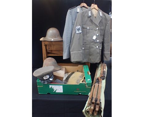 A COLLECTION OF MILITARIA including a  Baveyware Campaign folding bed (a/f), an army bed, post-war German jackets, tin helmet