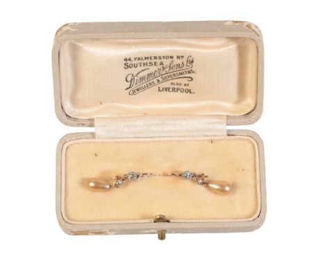A PAIR OF VINTAGE FAUX PEARL AND DIAMOND DROP EARRING in 9ct gold, each set with a round cut diamond, suspending a round cut 