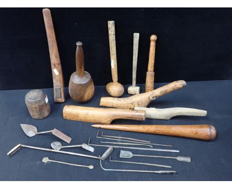 A COLLECTION OF ANTIQUE TOOLS including a fid, lead dressers, a mason's mallet, etc