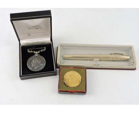 A Sheaffer fountain pen, with an engine turned 12k gold filled body, in presentation case, together with a George V RAF 'Good