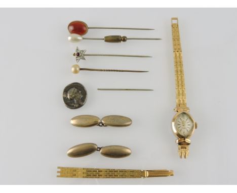 A ladies' cocktail watch, together with four stick pins, a pair of cufflinks and a coin.