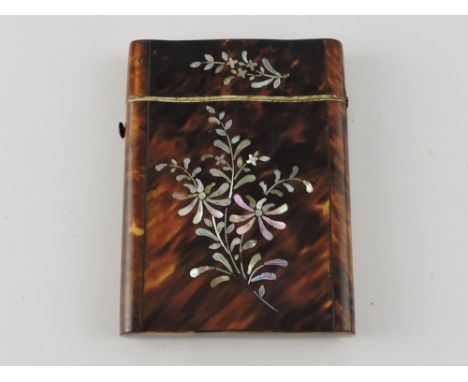 A 19th century rectangular tortoiseshell card case, ripple mounded with foliate mother-of-pearl inlay, 10.5cm. 