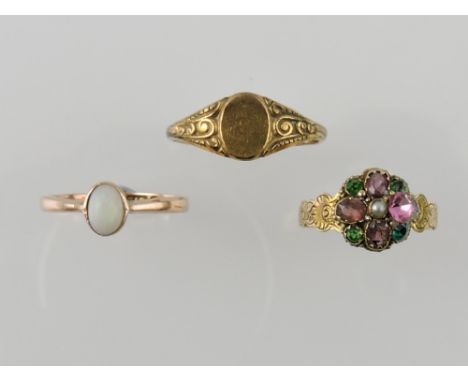 A 9ct gold and opal single stone ring, a 9ct gem and pearl set ring and a plated signet ring. (3)