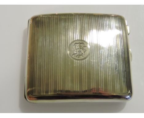 A George V engine turned silver cigarette case of curved rectangular form, William Neale, Birmingham 1918.