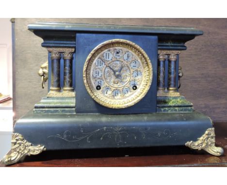 A late Victorian simulated marble and slate mantel clock with gilt decoration, W. 44cm.
