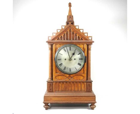 A large 19th century oak cased Gothic revival mantel clock, of architectural form, having an eight day movement, 68cm highOve