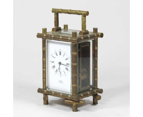 A 19th century brass cased carriage clock, with a simulated bamboo case, the white enamel dial signed Mason, Canterbury, with