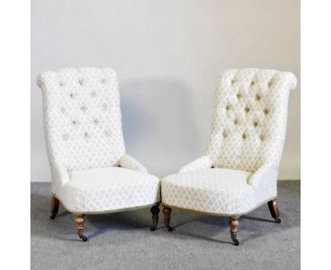 A pair of Victorian cream upholstered button back chairs, on turned legs (2)
