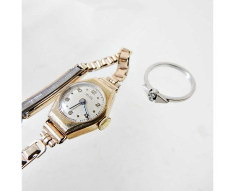 A platinum and diamond engagement ring, together with a mid 20th century gold plated ladies wristwatch (2)