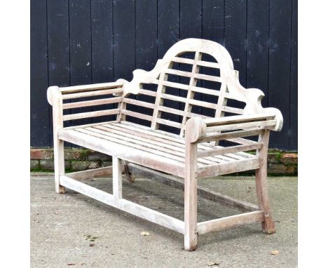A Lutyens style teak garden bench, 170cm wide