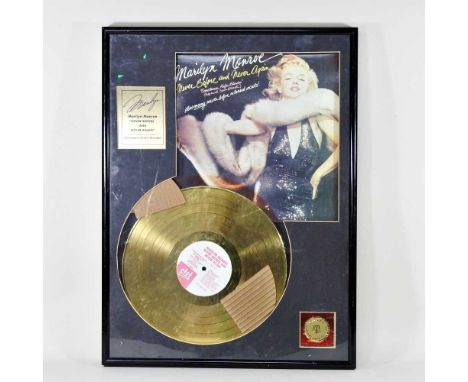 A gold disc for Marilyn Monroe, Never Before and Never Again, mounted and framed, 60 x 46cm