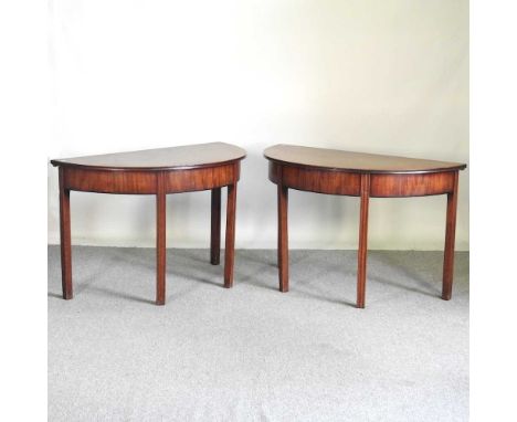 A pair of George III mahogany D-shaped side tables, on square moulded legs (2)118w x 58d x 73h cmOverall condition is solid a