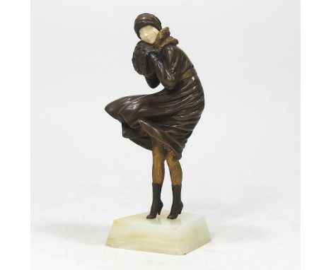 Demetre Haralamb Chiparus, 1886-1947, The Squall, a bronze figure of an Art Deco lady, early 20th century, wrapped against th