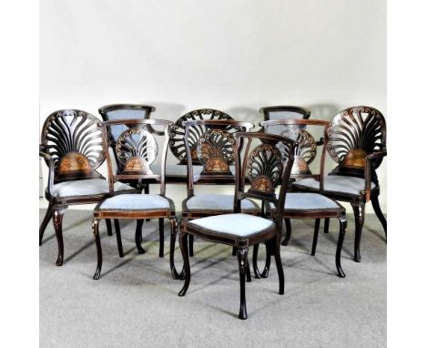 A late Victorian marquetry salon suite, comprising a set of four chairs, a pair of armchairs and an ivory inlaid sofa (7). No
