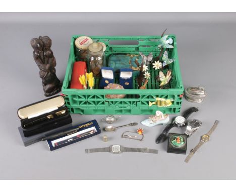 A tray of collectables including assorted pens, quartz watches, British coins, table lighter, gold plated tie slide, etc.  