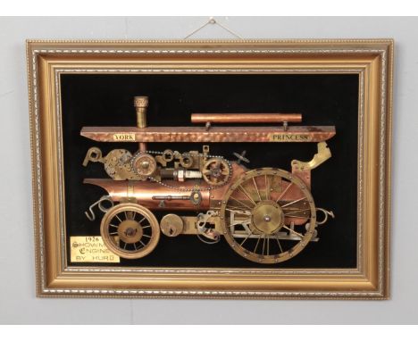 A gilt framed copper and brass train model display in the form of a 1926 Showman Engine by Hurd. Approx. dimensions including
