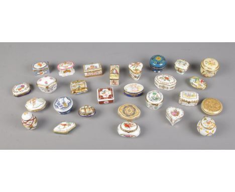 A collection of mostly DelPrado trinket boxes of various shapes and sizes.  
